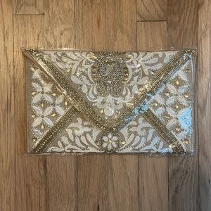 12th Tribe Ivory and gold clutch